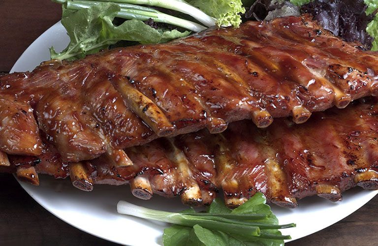 @ racks of succulent marinated pork ribs.